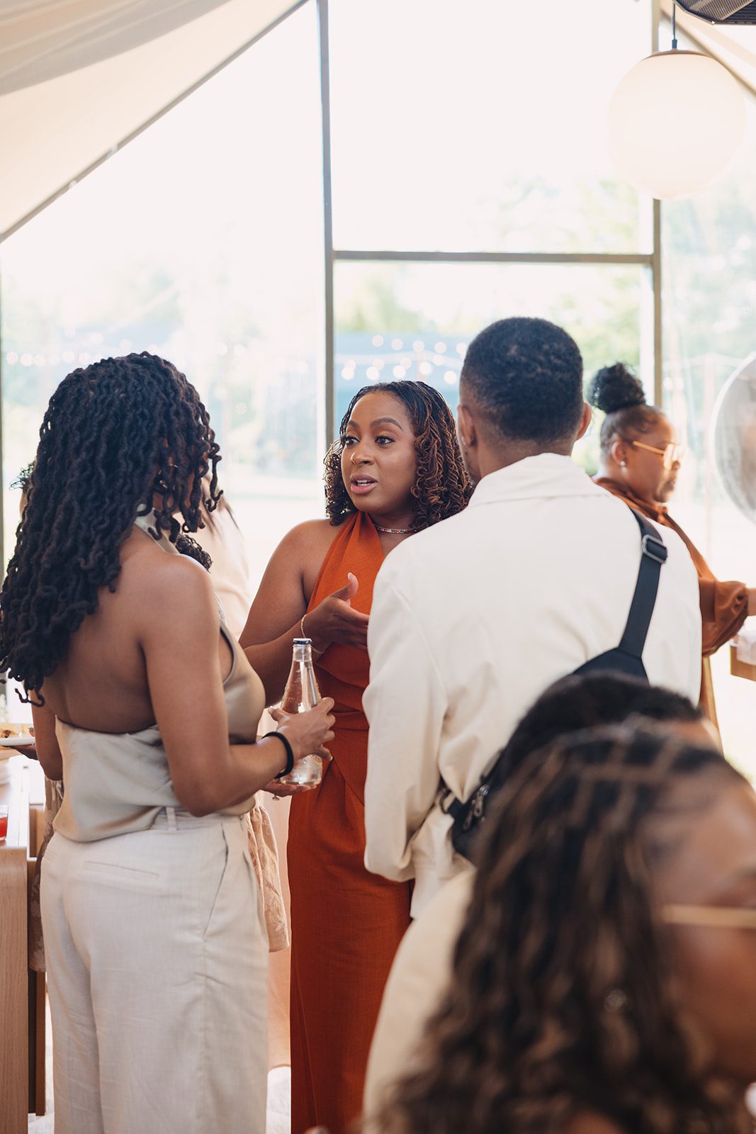 Jazmine and Jaleesa engagement dinner lounge seating vignette in Maryland — Creative Motion Events