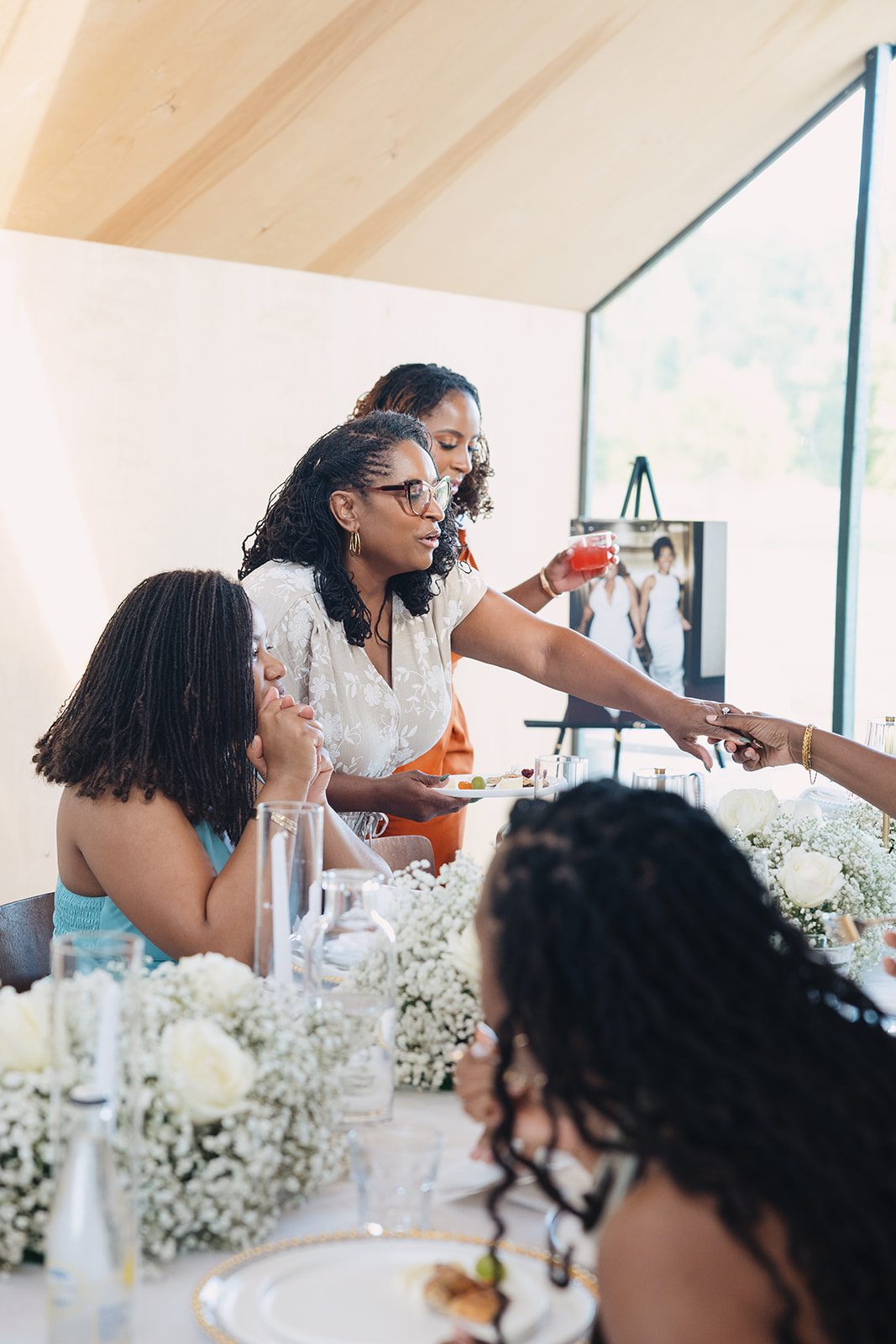 Jazmine and Jaleesa engagement dinner lounge seating vignette in Maryland — Creative Motion Events