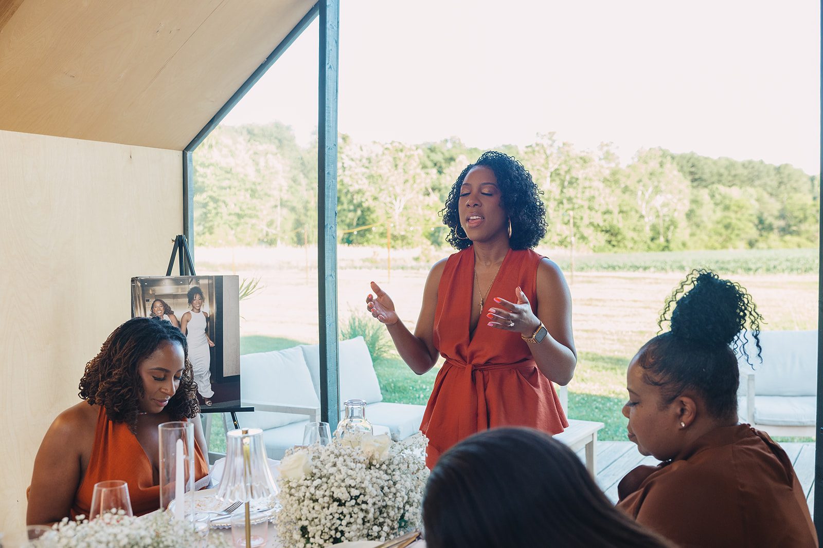 Jazmine and Jaleesa engagement dinner tablescape with florals in Maryland — Creative Motion Events
