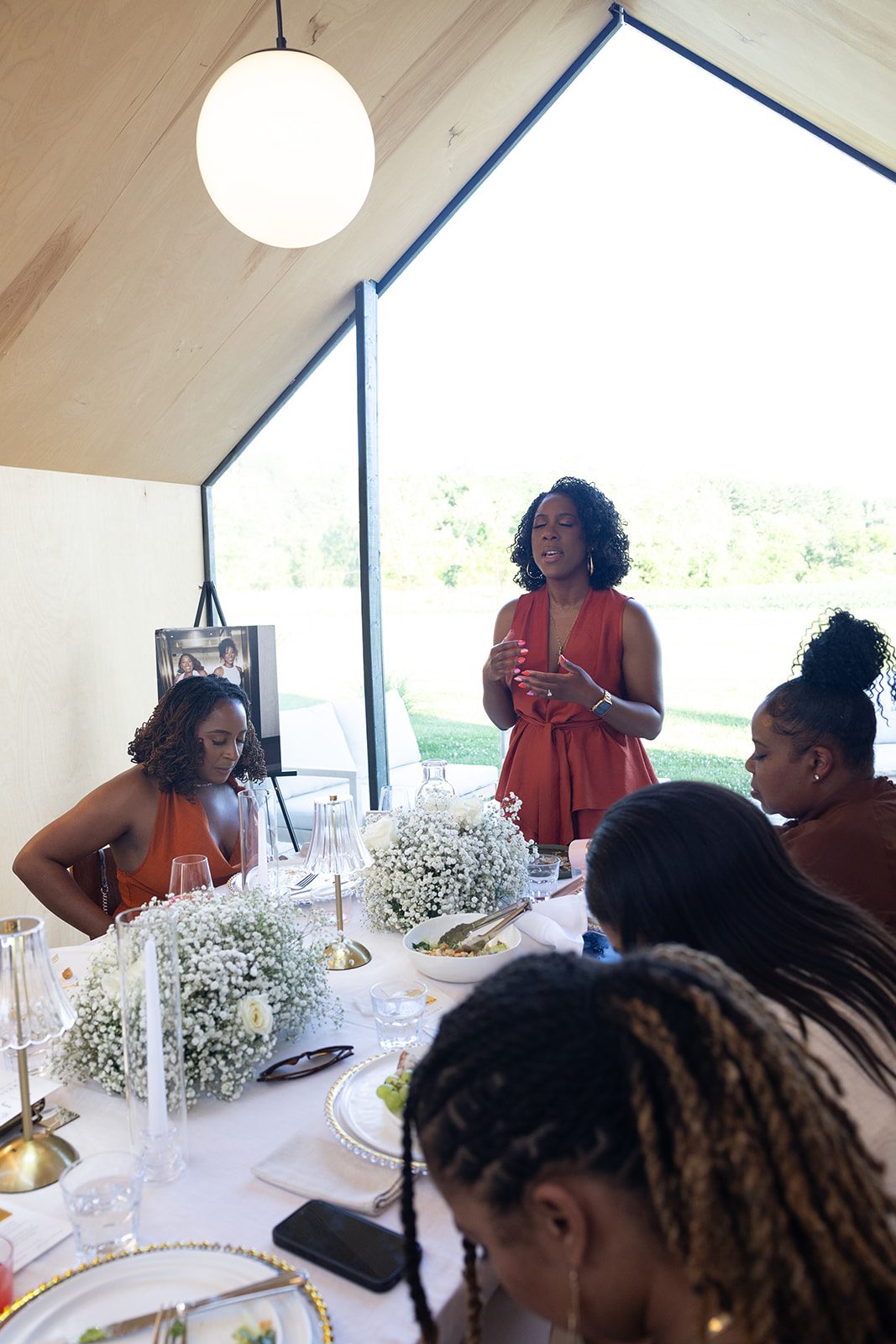 Jazmine and Jaleesa engagement dinner lounge seating vignette in Maryland — Creative Motion Events
