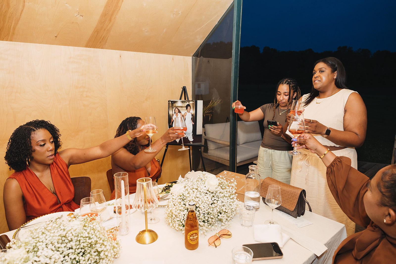 Jazmine and Jaleesa engagement dinner lounge seating vignette in Maryland — Creative Motion Events